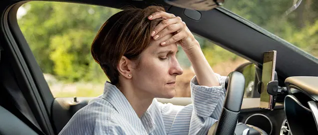 patient with headache needing auto accident chiropractor in Ontario, CA