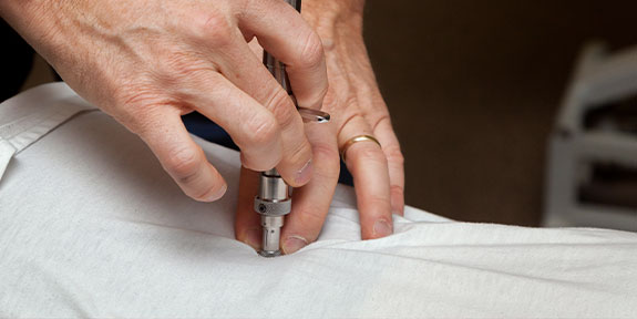 patient getting activator methods in Ontario for auto accident injury